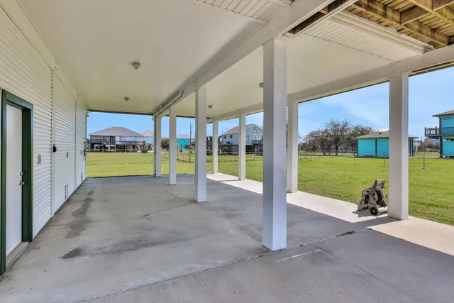 a view of a balcony with wooden floor