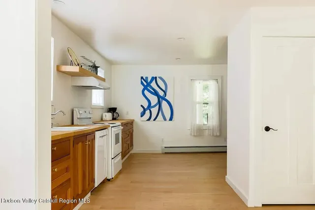 a view of a kitchen with a sink