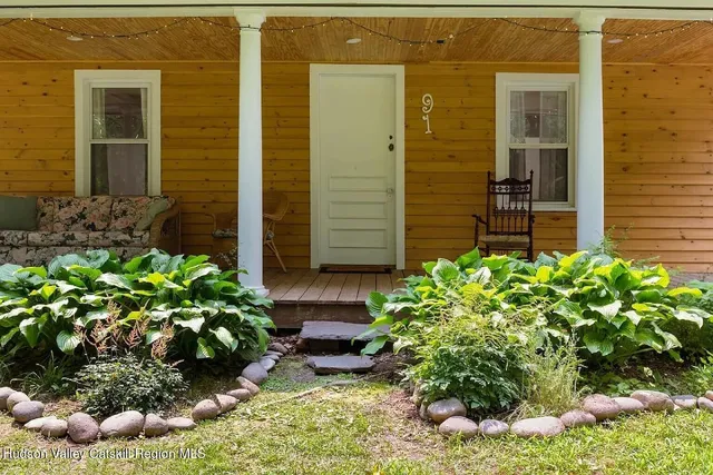 a plant is in front of a house