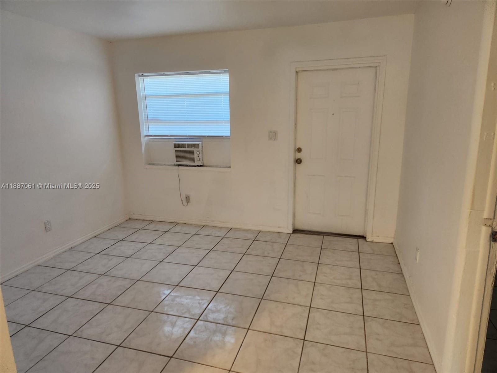 2640 Northwest 2nd Street, Unit 3 Pompano Beach, FL 33069 - Photo 4 of 9 a view of an empty room