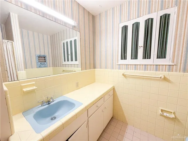 a bathroom with a sink and a bathtub