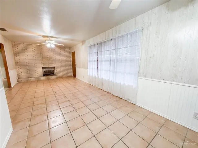 a view of a livingroom with a large window