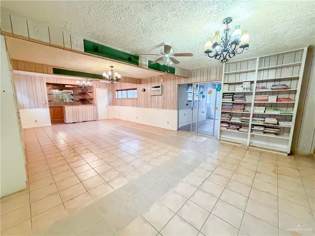 a view of a kitchen with furniture and cabinets