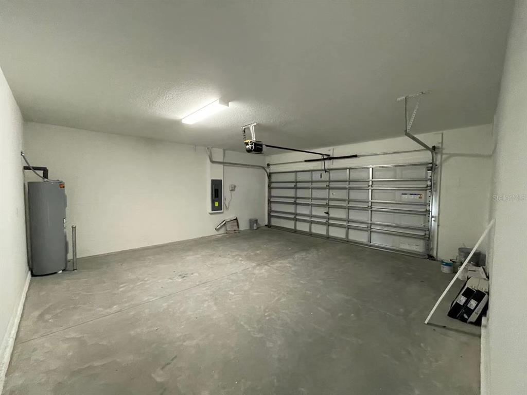 31875 Sun Kettle Loop Wesley Chapel, FL 33545 - Photo 21 of 23 a view of a room with gym equipment