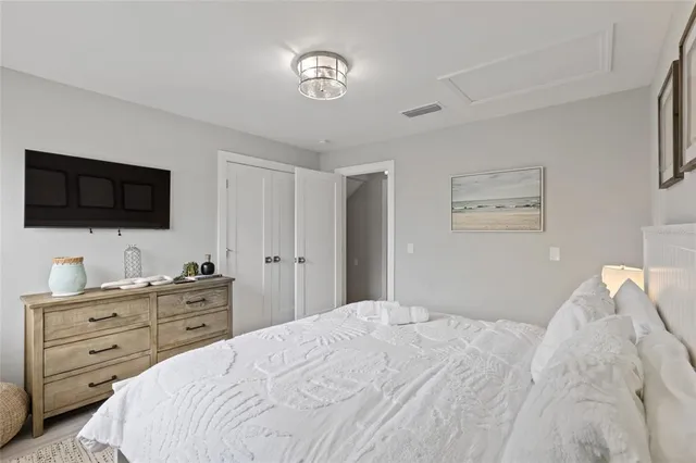 a room with a bed and a window