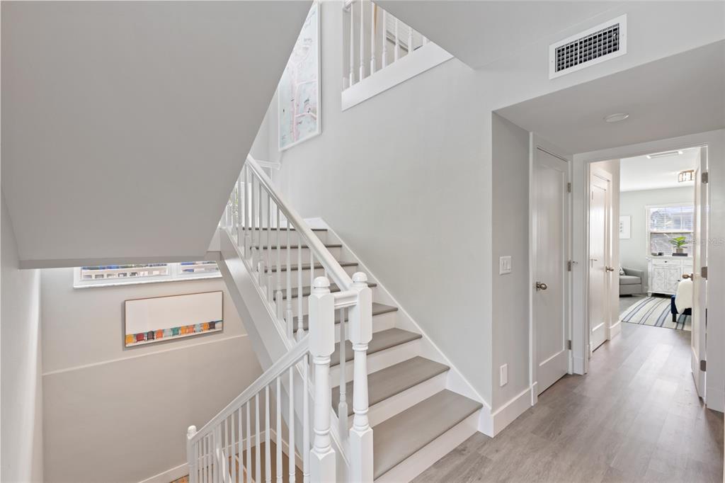 110 Spring Avenue Anna Maria, FL 34216 - Photo 17 of 62 a view of entryway with wooden floor