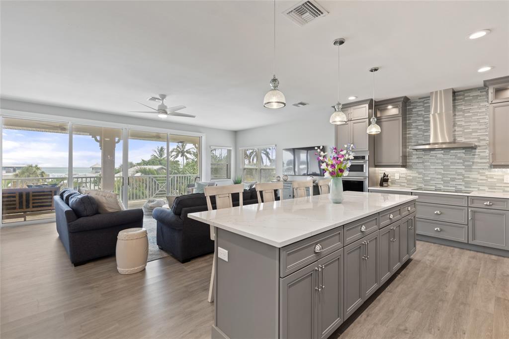 110 Spring Avenue Anna Maria, FL 34216 - Photo 39 of 62 a large white kitchen with a large window