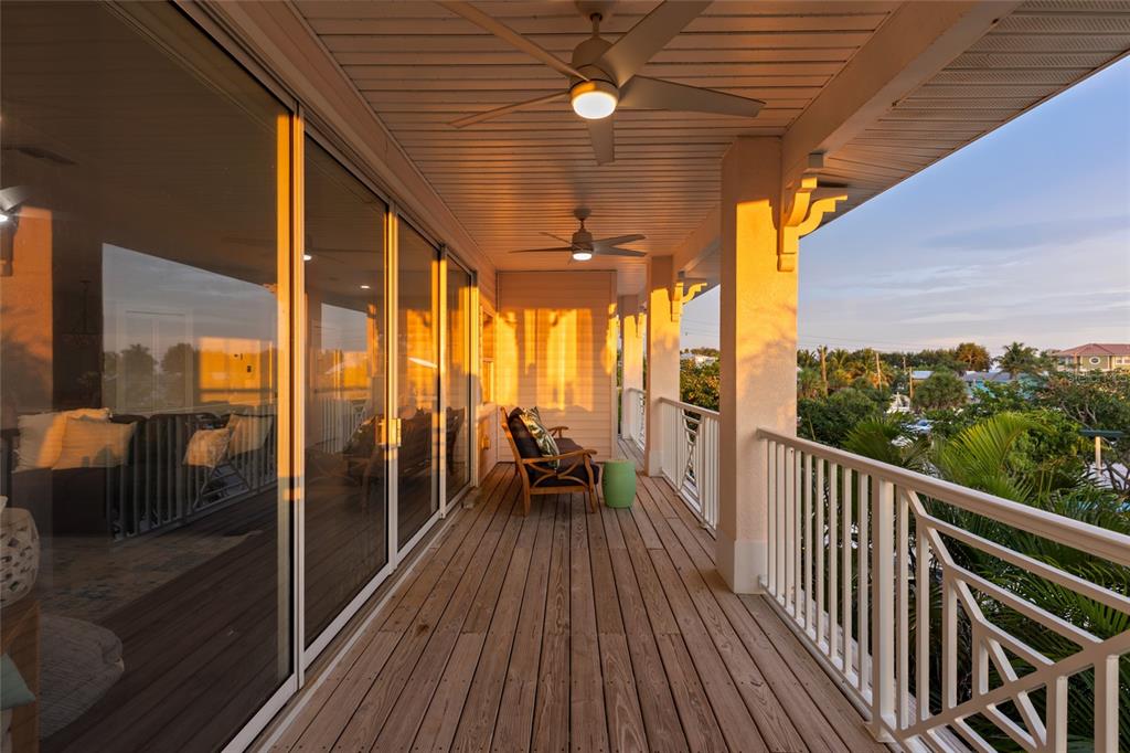 110 Spring Avenue Anna Maria, FL 34216 - Photo 50 of 62 a view of balcony with couch