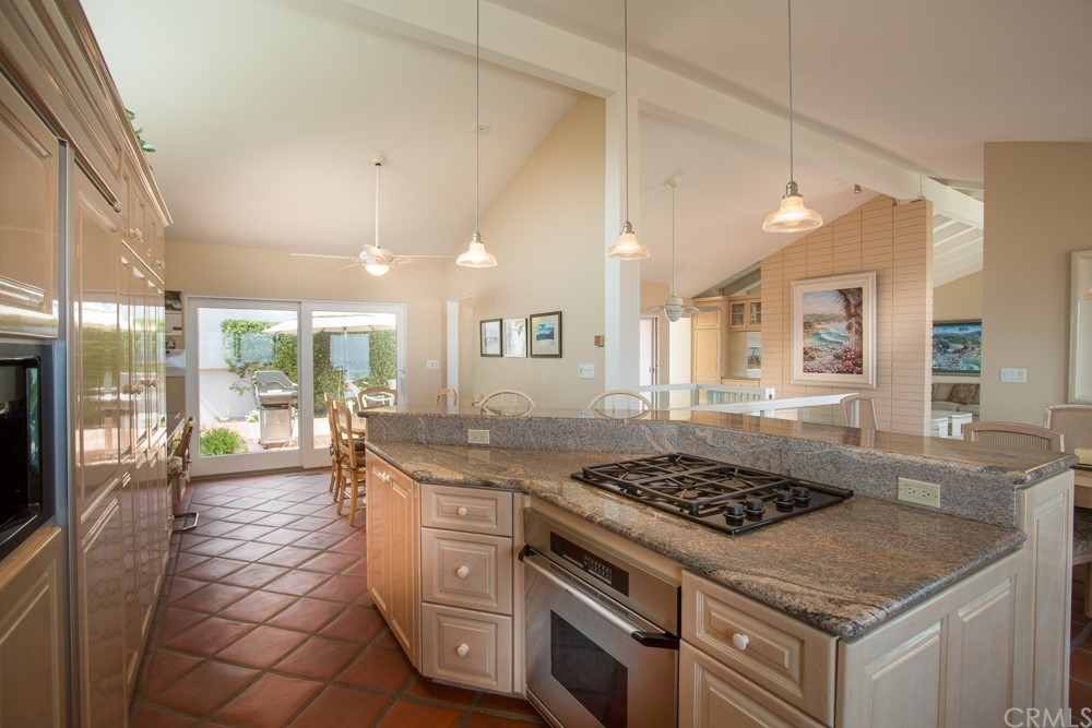 1004 Emerald Bay Laguna Beach, CA 92651 - Photo 5 of 15 a kitchen with stove and cabinets