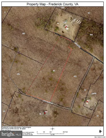 a black and white photo of a field