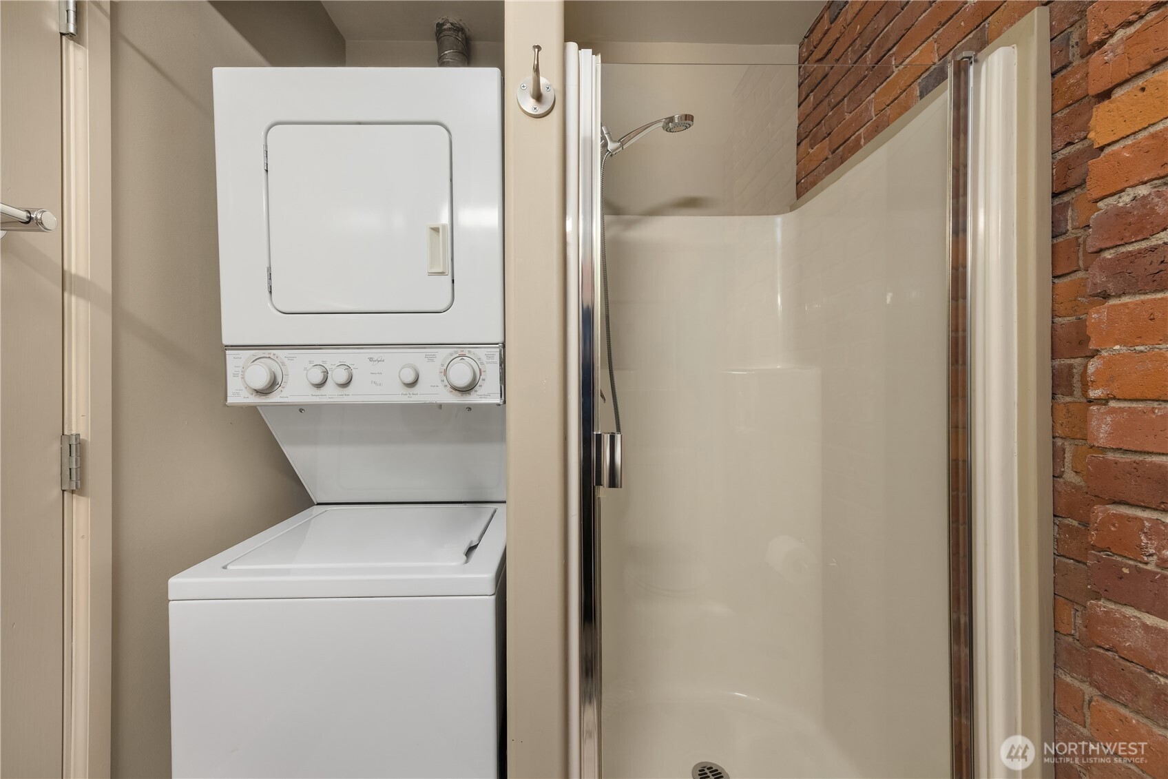 210 3rd Avenue South, Unit 2C Seattle, WA 98104 - Photo 33 of 40 a utility room with dryer and washer