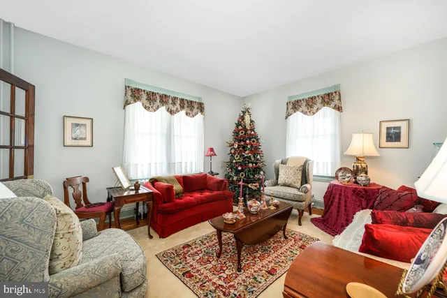 a bathroom with a sink and mirror with toilet