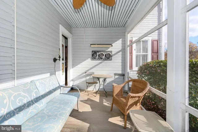 a bed room with a bed and a couch