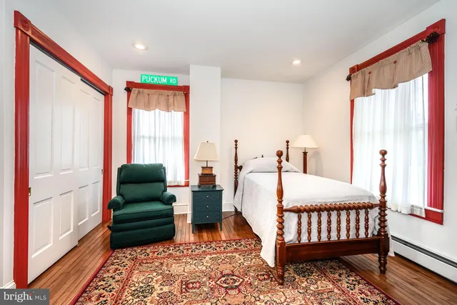 a picture of a bench in front of a building