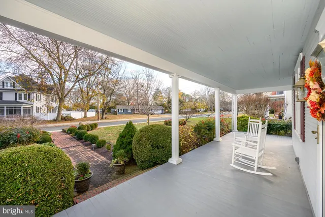 a view of balcony with furniture