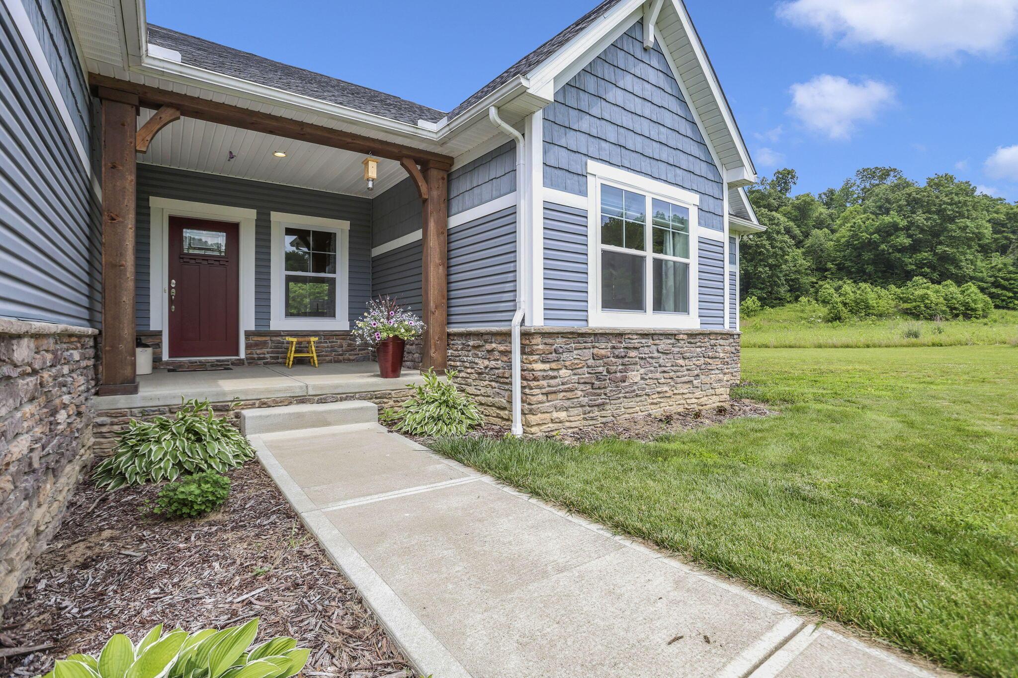 9660 Old Rainer Road Roseville, OH 43777 - Photo 13 of 71 Concrete porch for low maintenance
