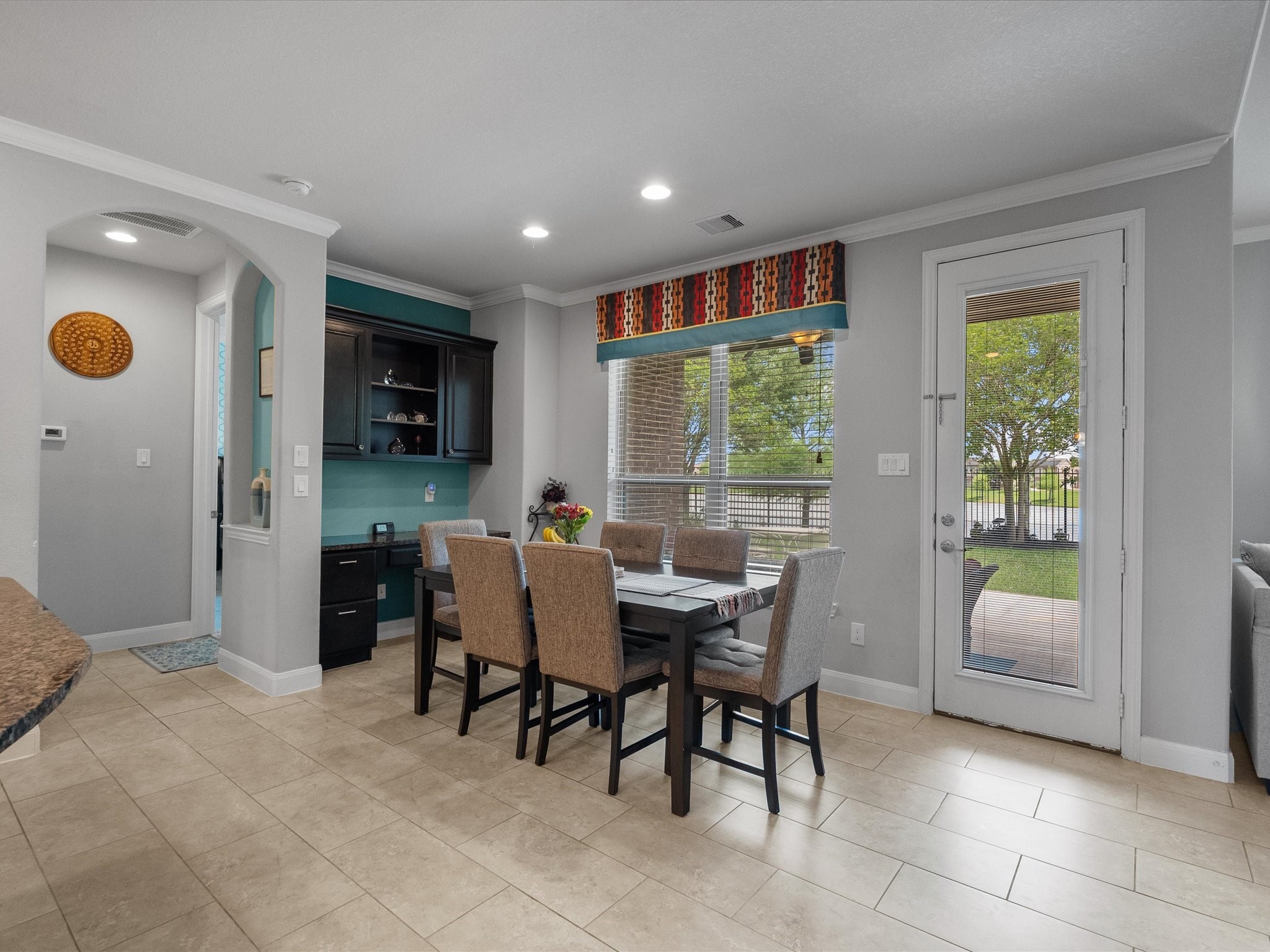 5323 Savannah Bend Lane Rosharon, TX 77583 - Photo 17 of 46 a dining room with furniture and a window