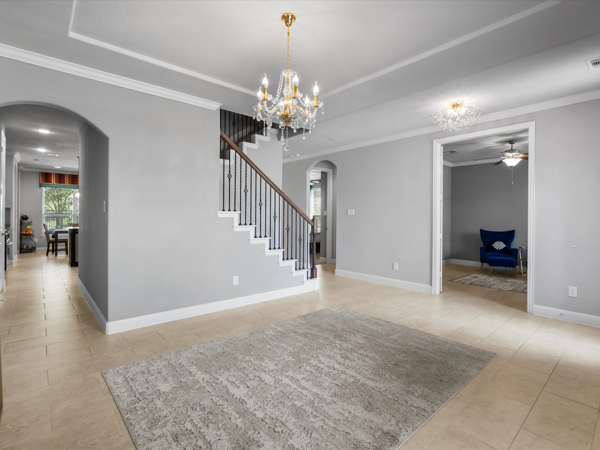 5323 Savannah Bend Lane Rosharon, TX 77583 - Photo 19 of 46 a view of a livingroom with a chandelier fan and windows