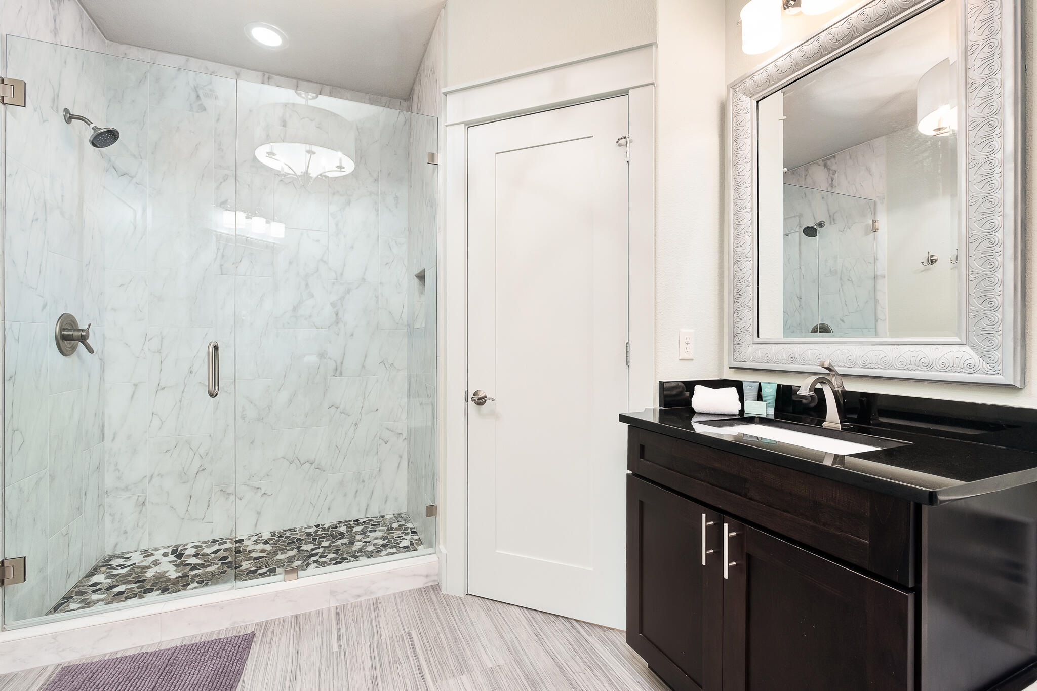 1959 Baytowne Loop Miramar Beach, FL 32550 - Photo 21 of 33 a bathroom with a sink and a mirror