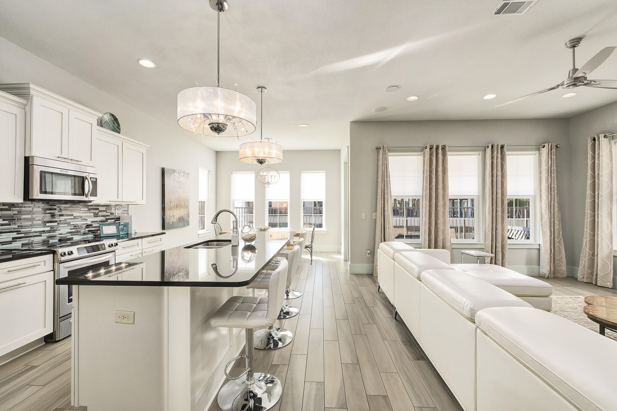 1959 Baytowne Loop Miramar Beach, FL 32550 - Photo 8 of 33 a very nice looking living room with a large window cabinets and stainless steel appliances