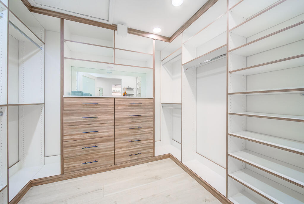 1853 Shower Tree Way Wellington, FL 33414 - Photo 19 of 31 a view of walk in closet