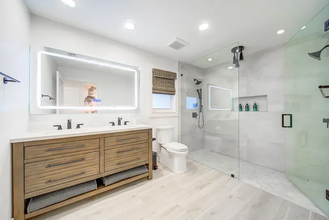 a bedroom with a bed and a walk in closet