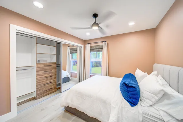 a bathroom with a bathtub and shower