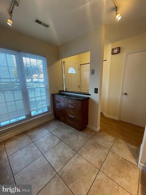 9646 Hingston Downs Columbia, MD 21046 - Photo 13 of 17 a view of a livingroom with wooden cabinets