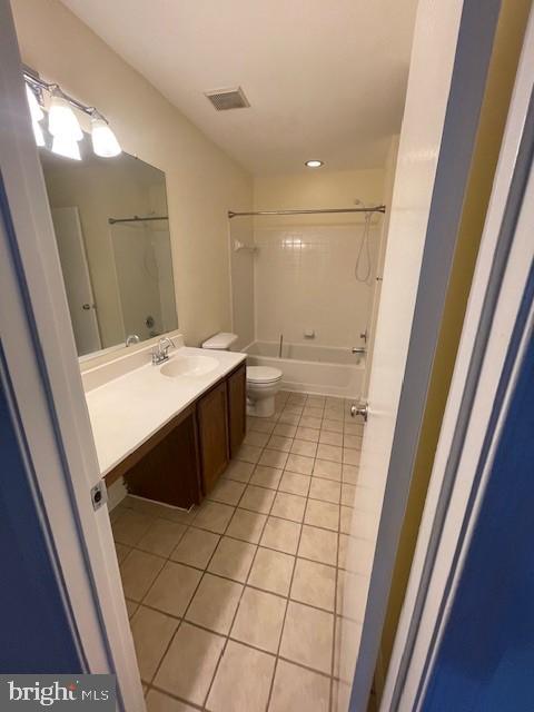 9646 Hingston Downs Columbia, MD 21046 - Photo 10 of 17 a bathroom with a sink a toilet and a mirror