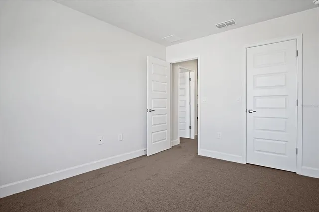 an empty room with closet
