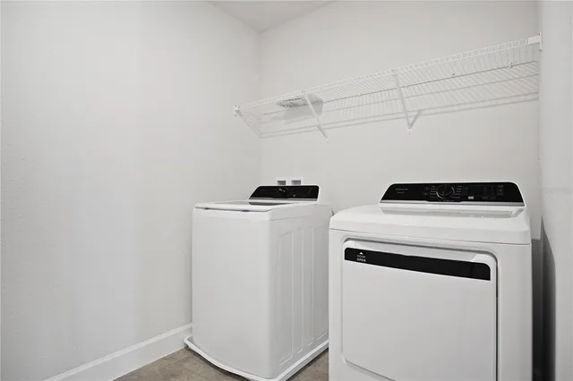 a view of a swimming pool with a yard