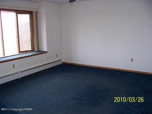 28 Cherry Ridge Road Layton, NJ 07851 - Photo 10 of 11 a view of a window in an empty room