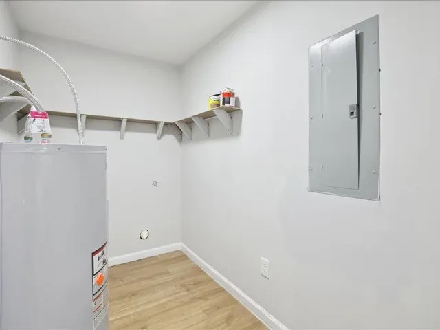 a view of a room with racks on the wall