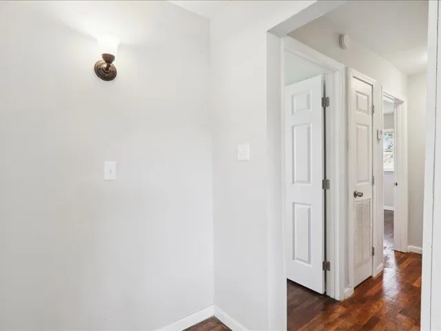 a view of a livingroom with wooden floor