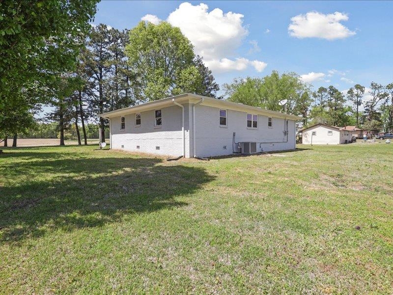 2725 Porter Road Mason, TN 38049 - Photo 28 of 33 a front view of a house with a yard
