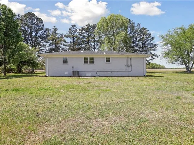 a house view with a garden space