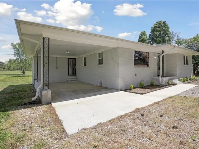 a view of a house with a patio
