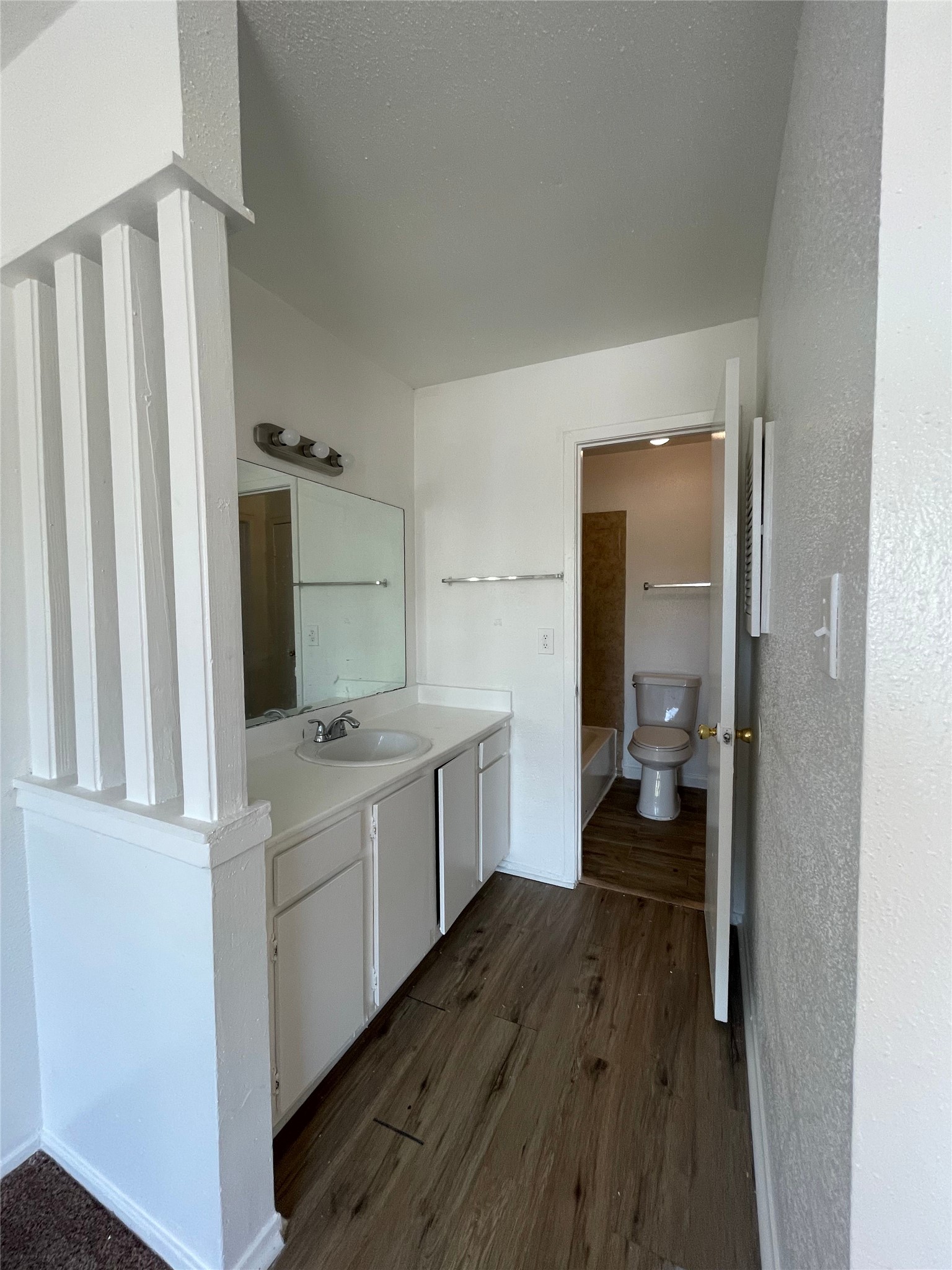 6200 West Tidwell Road, Unit 2102 Houston, TX 77092 - Photo 13 of 14 a kitchen with a sink stove and cabinets