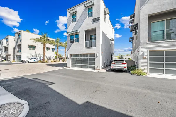 a view of a car parked in front of a building
