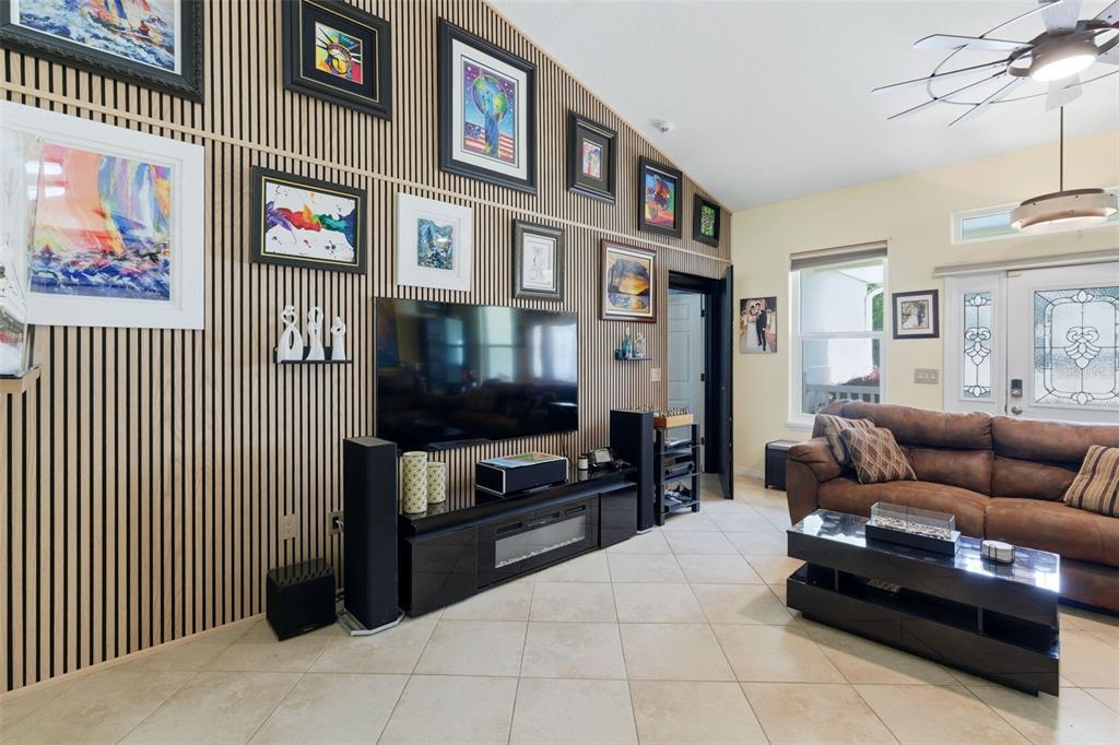 3510 Hunters Trail Circle Eustis, FL 32726 - Photo 13 of 26 a living room with furniture and a flat screen tv