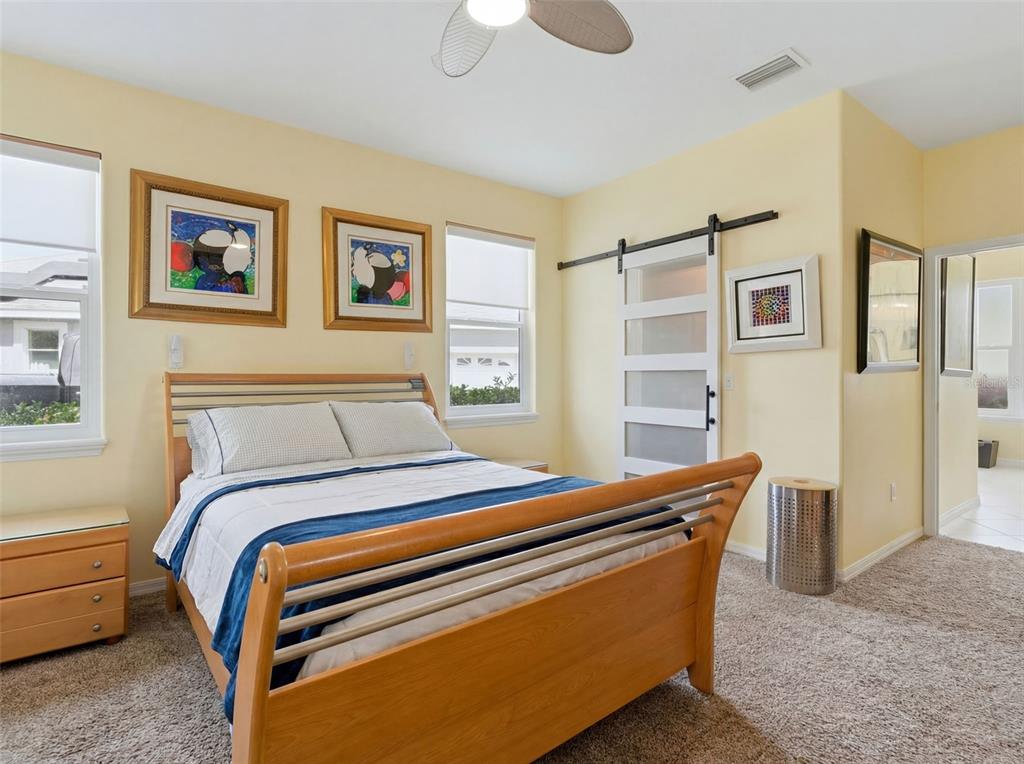 3510 Hunters Trail Circle Eustis, FL 32726 - Photo 15 of 26 a bed room with a bed and a window