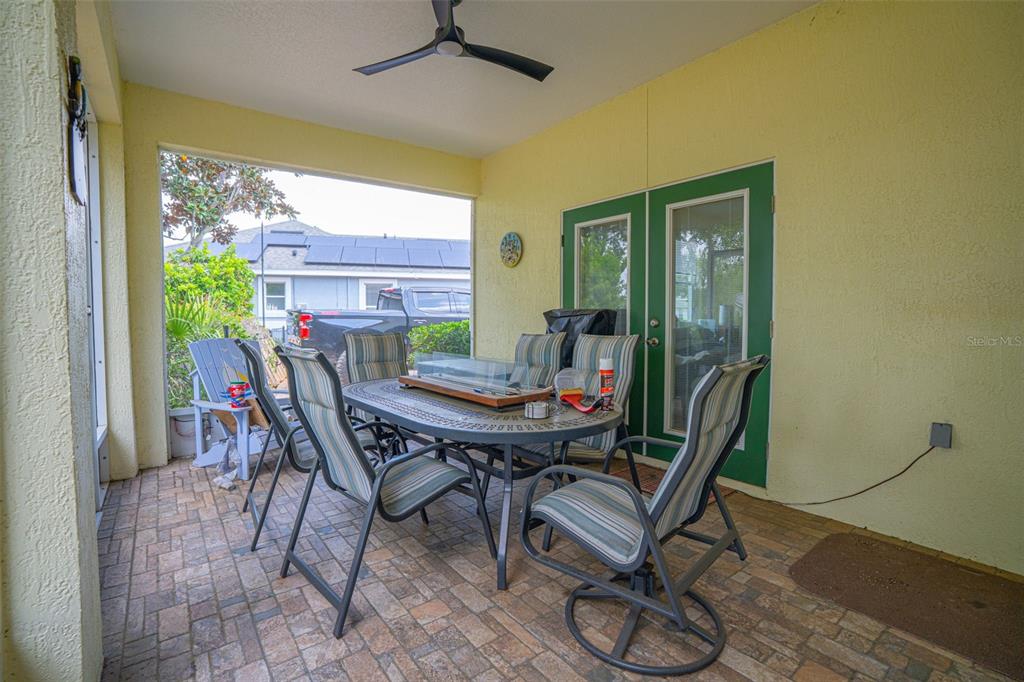 3510 Hunters Trail Circle Eustis, FL 32726 - Photo 21 of 26 a view of a dining room with furniture and wooden floor