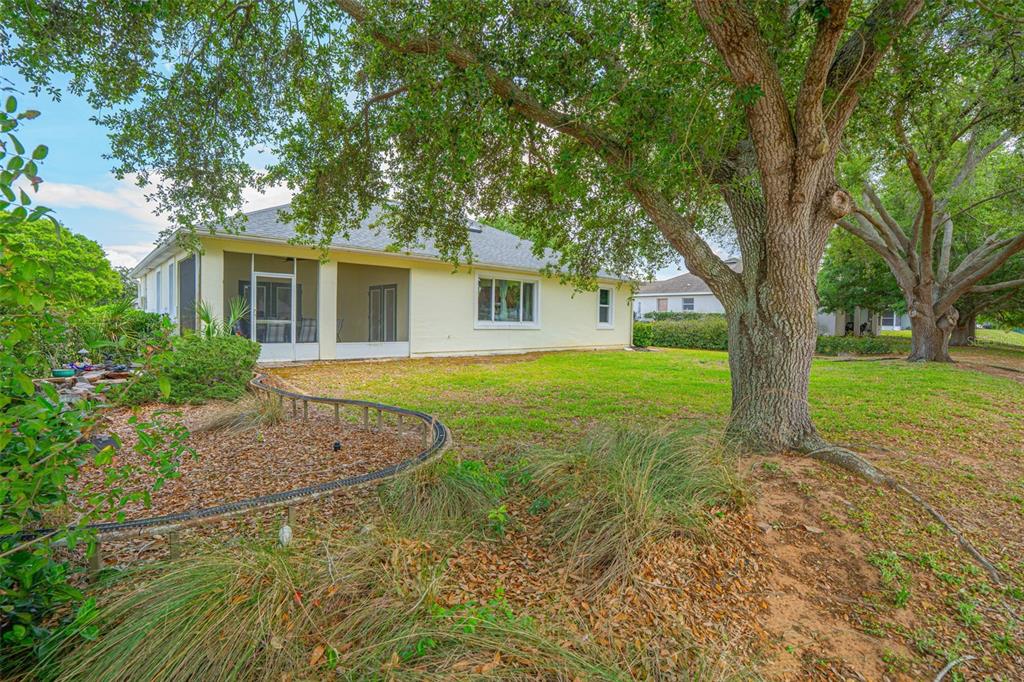 3510 Hunters Trail Circle Eustis, FL 32726 - Photo 23 of 26 a front view of house with yard and green space