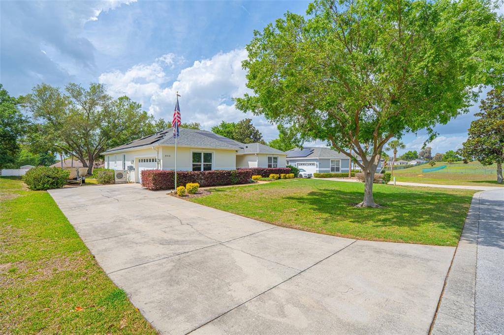 3510 Hunters Trail Circle Eustis, FL 32726 - Photo 4 of 26 a front view of house with yard and green space