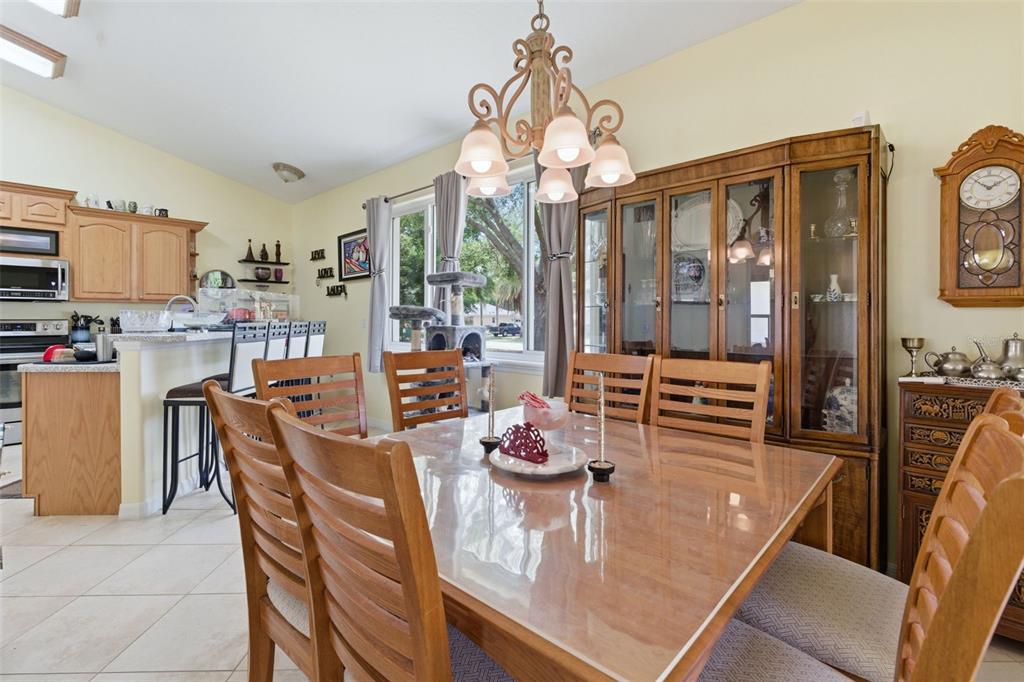 3510 Hunters Trail Circle Eustis, FL 32726 - Photo 9 of 26 a dining room with furniture and window