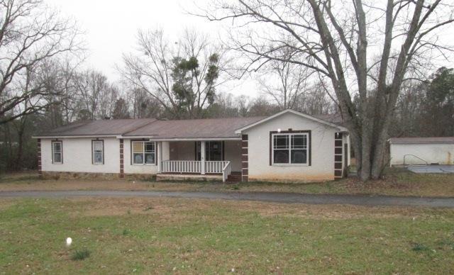 3839 High Falls Road Jackson, GA 30233 - Photo 1 of 1 a front view of a house with yard