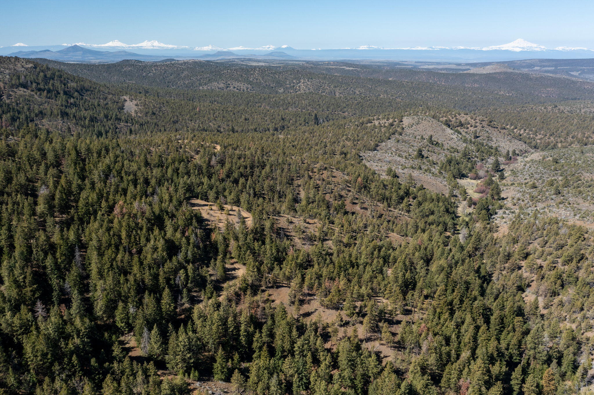 0 Southeast Grizzly Road, Unit 1215000000100 Madras, OR 97741 - Photo 15 of 39 a view of a city with mountains in the background
