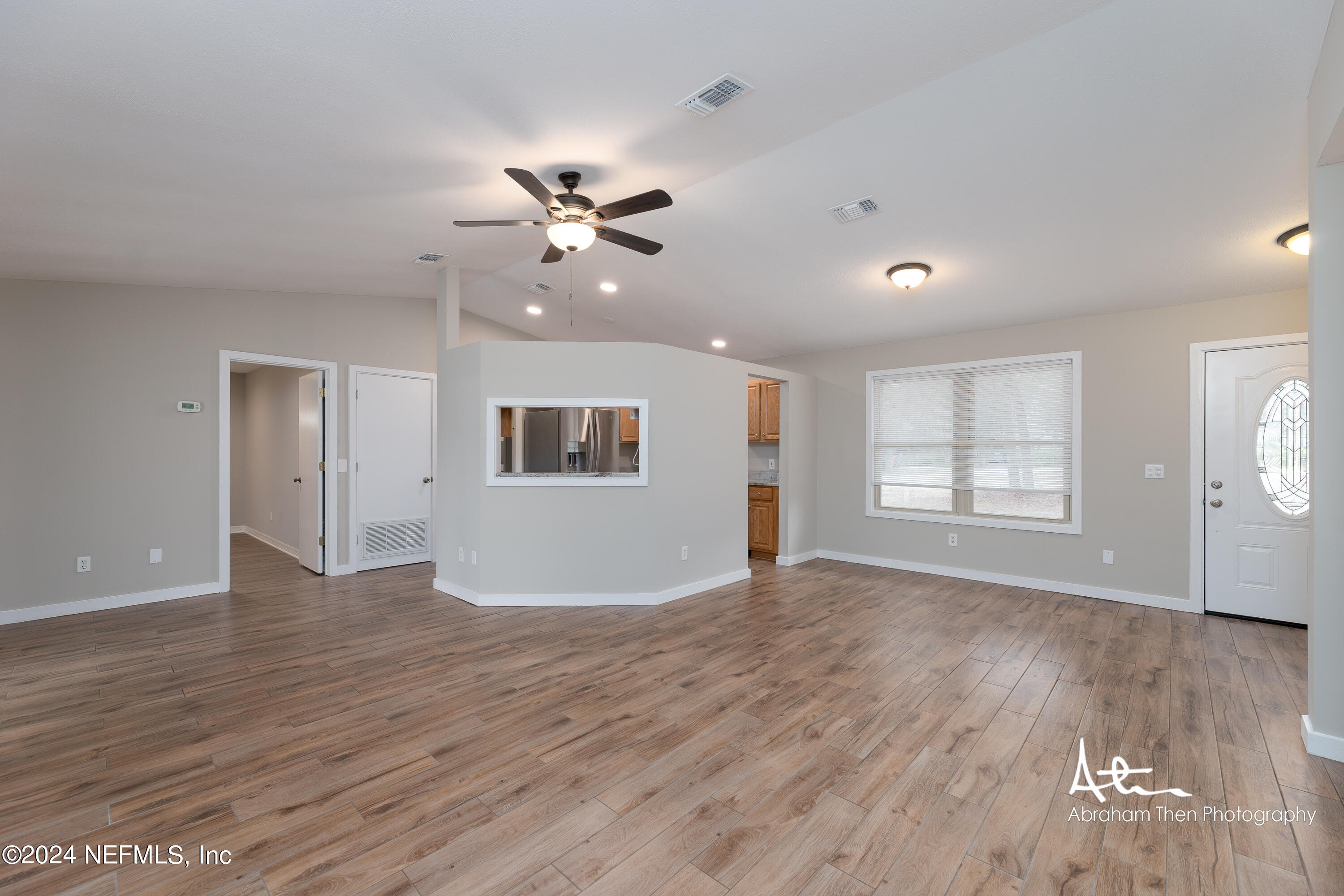 4274 Chokeberry Road Middleburg, FL 32068 - Photo 7 of 37 Living to Dining Room