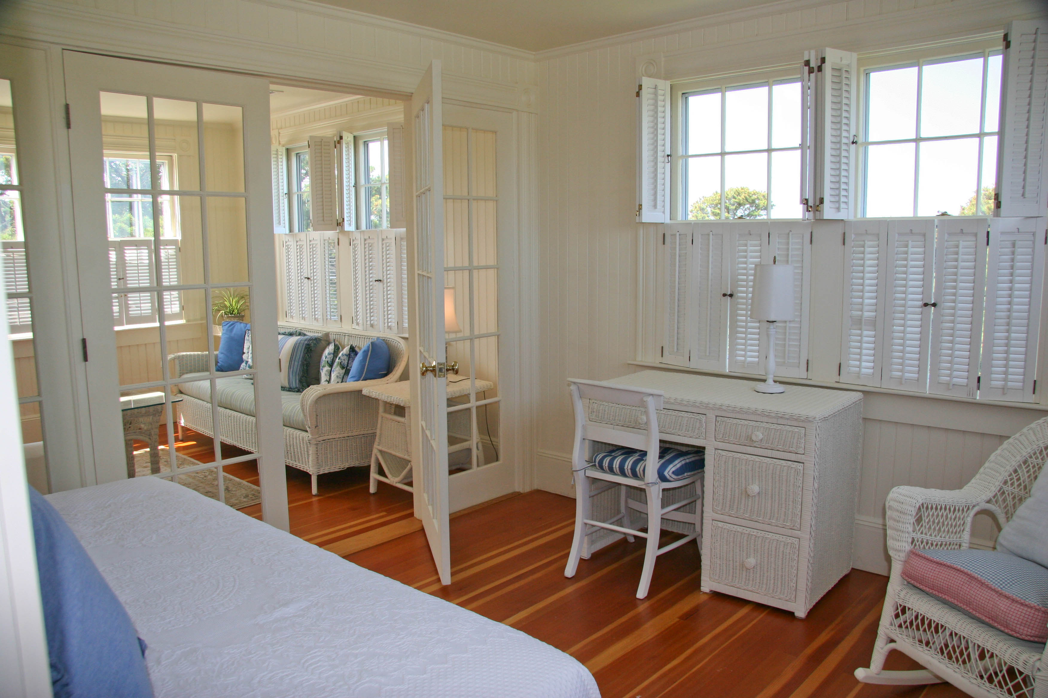 144 Surfside Road Nantucket, MA 02554 - Photo 29 of 46 a living room with furniture a wooden floor and next to a window