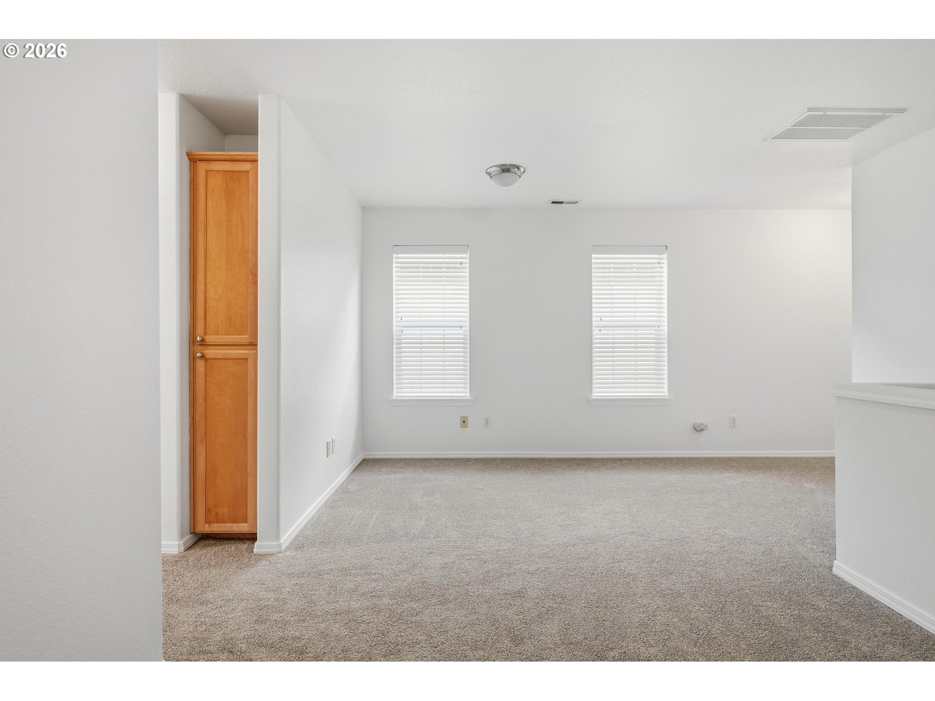 1638 Southwest 173rd Terrace Beaverton, OR 97003 - Photo 18 of 41 a view of an empty room with a window